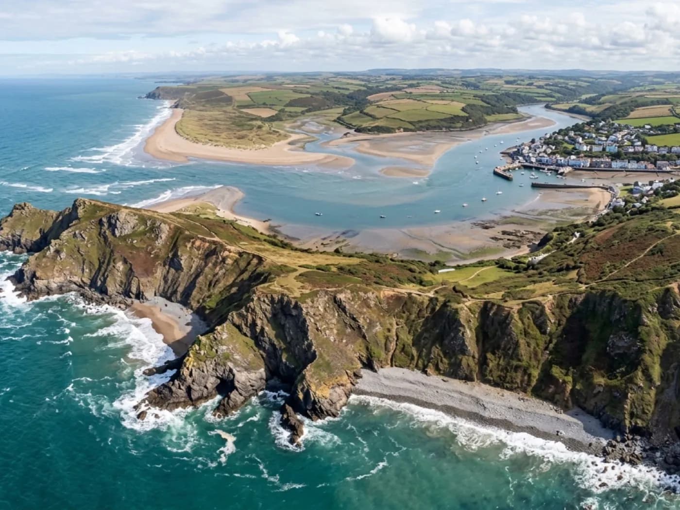 Aerial view of the North Devon coastline near Barnstaple and Bideford, cliffs and estuary side by side